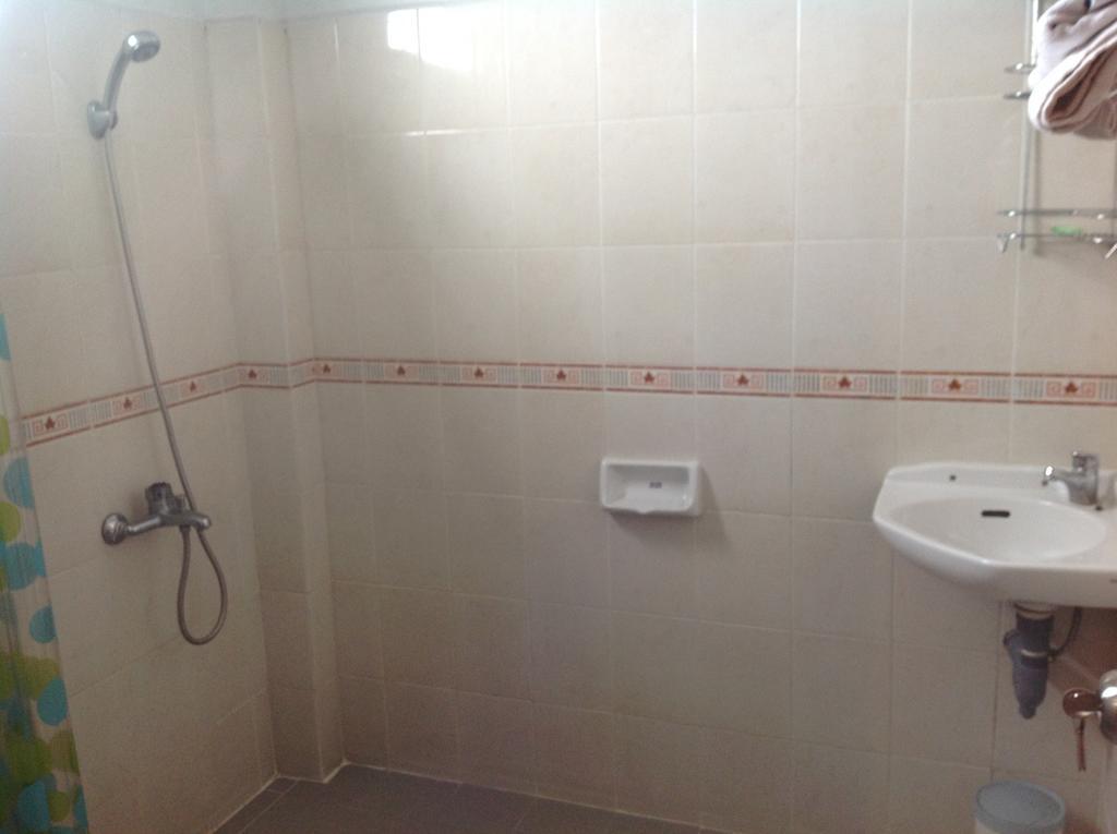 Carolina Transit Hotel Medan Szoba fotó